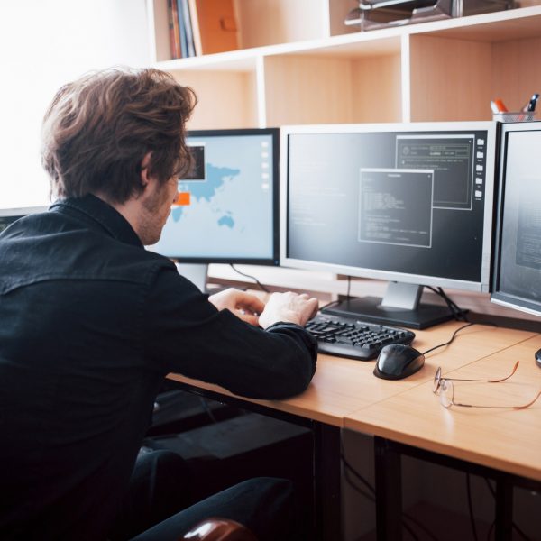 The young dangerous hacker breaks down government services by downloading sensitive data